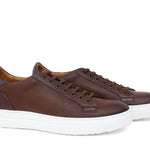 Sneaker traforata in vitello naturale marrone con fondo in gomma leggera 238DCAS 382  UN ROSSI 